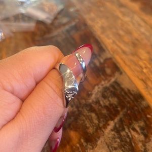 Adjustable, open silver ring. Snake design.